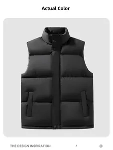 Detail view of black stand-collar puffer vest featuring snap buttons and side pockets
