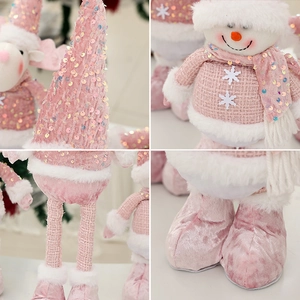 Pink Christmas snowman doll with sequins and velvet texture for holiday window display
