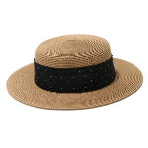 Elegant boater straw hat with black rhinestone band for summer beach and sun protection