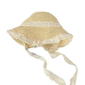 Summer straw beach sun hat for women with elegant white lace trim and long ribbon ties