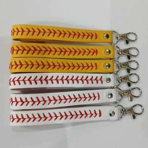 Set of six leather baseball and softball keychains with red V-stitching and silver clasps