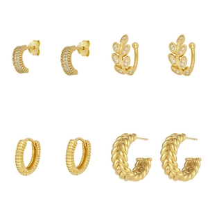Set of four French vintage gold plated geometric earrings and ear cuffs with zircons