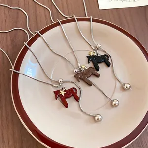 Three-color horse pendant necklaces with star charms on silver snake chains