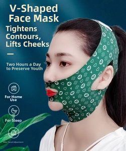 Detail of green V-line lifting mask with ergonomic ear holes and patterned elastic fabric