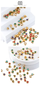 Detailed view of geometric gold-plated stainless steel pendants with colorful rhinestones