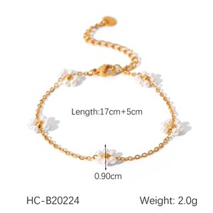 Dettaglio del bracciale a fiori dorati con perle inclusi i dati su lunghezza e peso