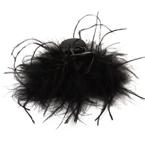 Elegant large black ostrich feather hair claw clip for women in a minimalist style