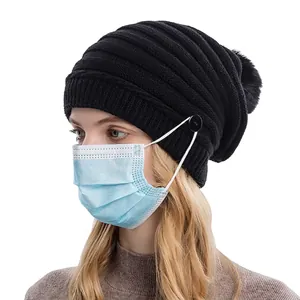 Bonnet en tricot noir pour femme avec pompon et boutons pour attacher le masque