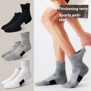 Detail of thickened terry lining and anti-skid grip on professional athletic crew socks