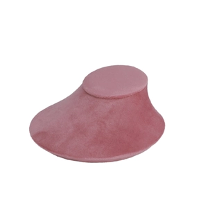 Detailed view of pink velvet necklace display stand with soft premium texture