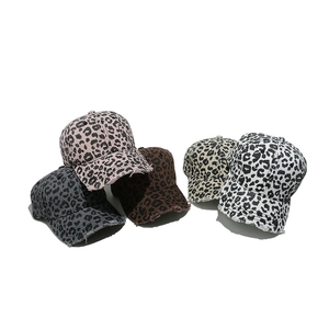 Set of five vintage leopard print baseball caps with distressed brim details