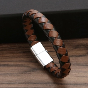 Handmade woven leather bracelet in black and brown with vintage silver metal clasp