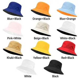 Various colorful reversible bucket hats in breathable cotton displayed on white background