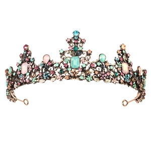 Vintage bronze king crown with colorful gemstones and crystals for costume parties