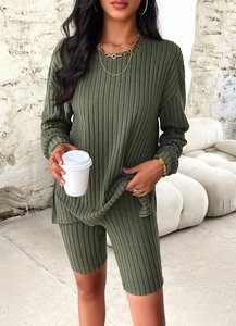 Detail view of olive green ribbed knit long sleeve top and matching shorts set