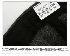 Detail view of cotton baseball cap interior featuring thick sweatband and material labels