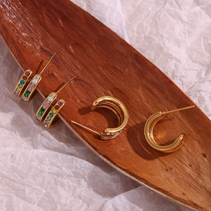 Close-up of 18K gold plated double C-shaped earrings with colorful zircon stones