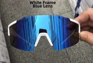 Detail of white semi-rimless cycling glasses with a large blue mirror lens for outdoor sports