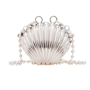 Chic silver shell-shaped mini metal evening bag with glossy finish and pearl bead chain