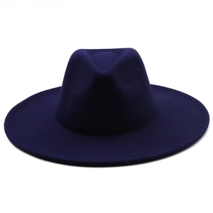Detailed view of a navy blue wool felt wide-brim fedora hat with a flat brim and top groove
