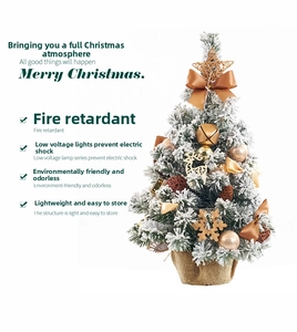 Detail of 0.6m mini Christmas tree with snow effects, gold ornaments and burlap base