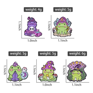 Detailed view of Halloween magic frog enamel pins showing dimensions and weights