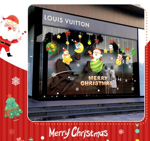 Detail view of festive Christmas window stickers set with Santa, reindeer and tree