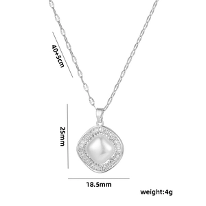 Square 18k gold plated titanium necklace with pearl and zircon pendant on white background