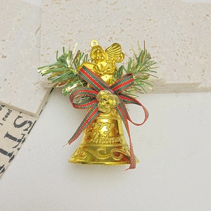 Golden Christmas bell with festive plaid bow and Merry Christmas engraving for tree decor