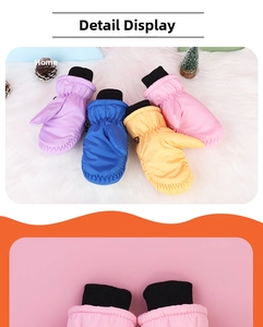 Detailed view of waterproof winter ski mittens with windproof elastic knit cuffs for kids