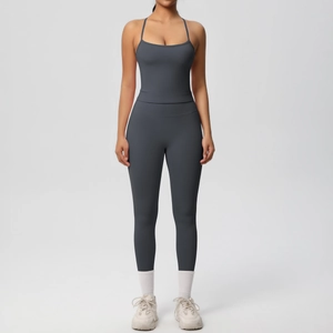 Detail of charcoal grey seamless yoga set featuring slim strap top and high waist leggings