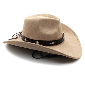 Detail of tan suede cowboy hat with turquoise star leather band and wind rope