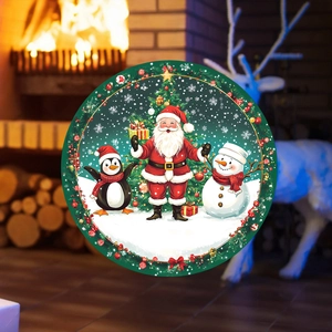 Round Christmas decorative plate featuring Santa Claus and snowman on forest green background