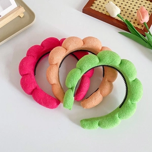 Three plush twist cloud headbands in rose red, orange pink and green for face washing