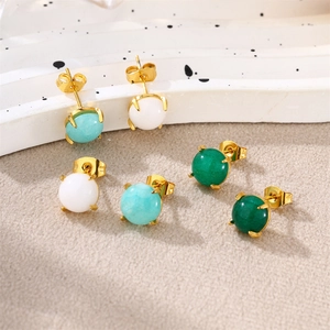 Detailed view of 18k gold plated stainless steel studs with white, turquoise and green stones