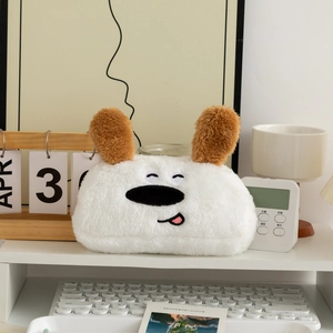 Detailed embroidery of cute plush cartoon dog stationery pouch on a cozy desk setup