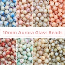 Dettaglio di perle tonde in vetro aurora crackle da 10mm in vari colori per gioielli
