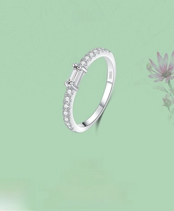 Macro shot of S925 sterling silver ring with rectangular zircon and hallmark detail