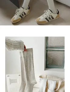 Detail of oatmeal ribbed cotton calf socks showing soft knit texture and styling with sneakers