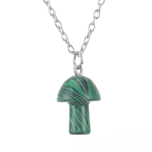 Close-up of a 2cm green and black striped mushroom pendant with a silver metal chain