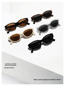 Collection of retro square cat-eye sunglasses in multiple colors on white display stands