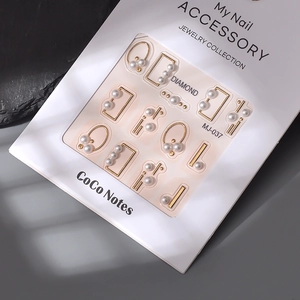5D stereoscopic nail art stickers with golden geometric frames and pearls on card