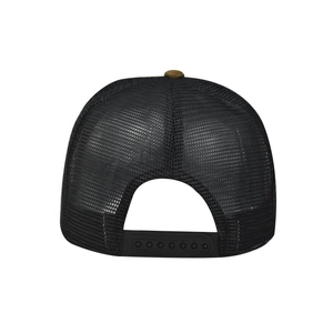Detail view of the brown corduroy trucker hat with black mesh back and snapback closure