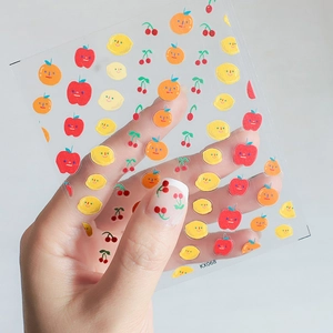 5D fruit themed nail stickers with cute apple and cherry illustrations on nails