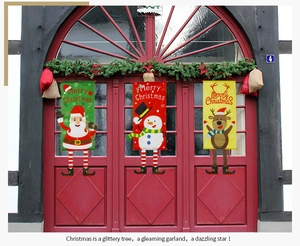 Detail of Christmas felt door hangers with 3D dangling legs showing Santa, Snowman and Reindeer