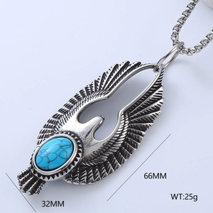 Macro side view of eagle wing pendant necklace with turquoise stone and box chain