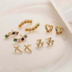 Gold plated earring set featuring heart, cross and clover designs with colorful crystals