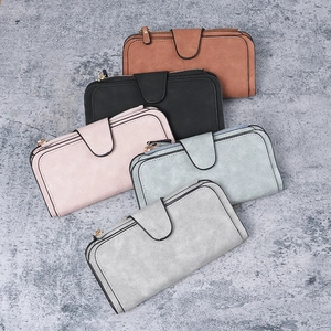 Long faux leather women's wallets with buckle closure and zip pocket in multiple colors