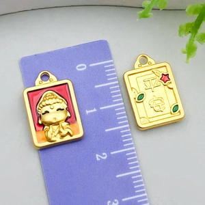 Macro view of gold-plated safety lock charms with enamel Pingan text and size ruler