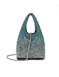 Detail of silver and blue rhinestone bucket bag with crystal handle and metal chain